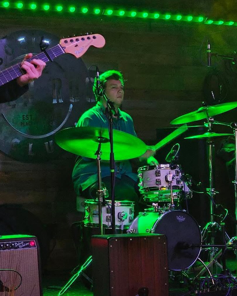 Bennett Quidachay on drums